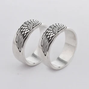 Обручальные кольца из белого золота "Крылья ангела"