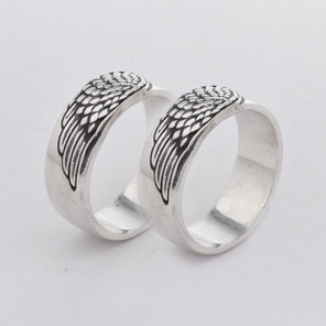 Обручальные кольца из белого золота "Крылья ангела"