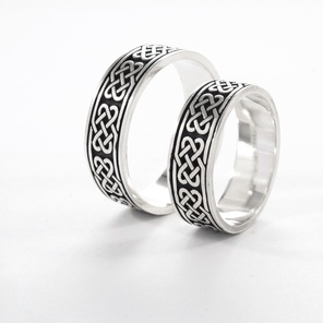 Широкие золотые обручальные кольца Обручальные кольца со славянским орнаментом "Узел любви"