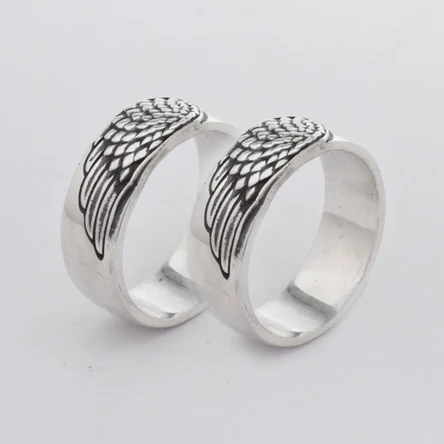 Обручальные кольца из белого золота "Крылья ангела"