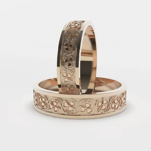 Золотые обручальне кольца Клевер